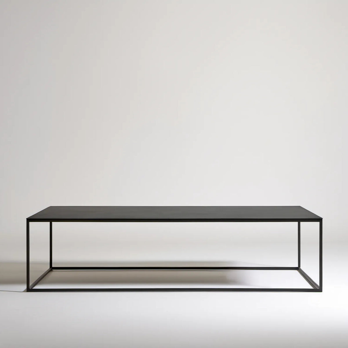 Prostokątny stolik kawowy czarny 120 x 60 x 35 cm z blatem MDF i stalową ramą